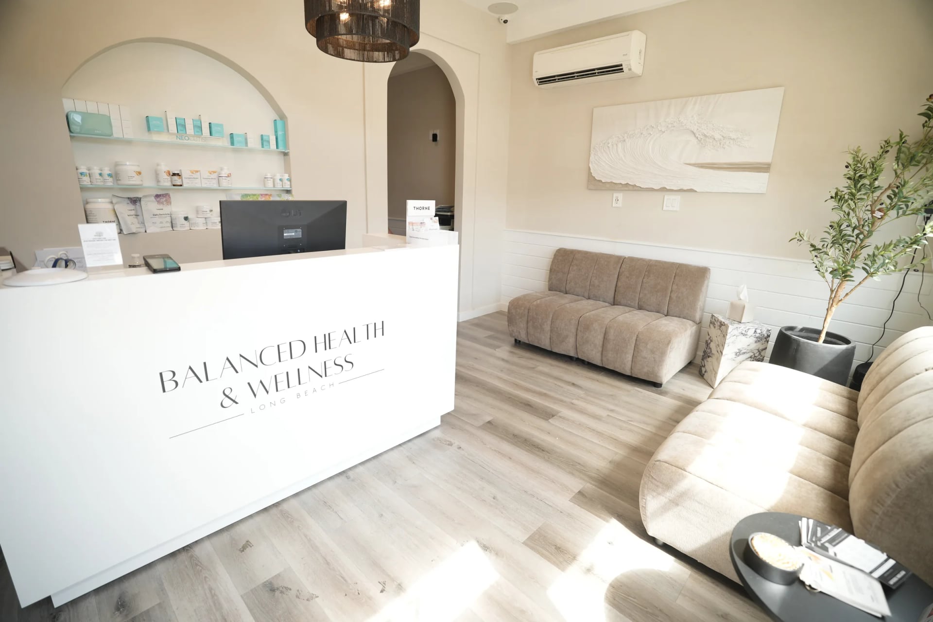 The front desk and waiting room at Balanced Health & Wellness